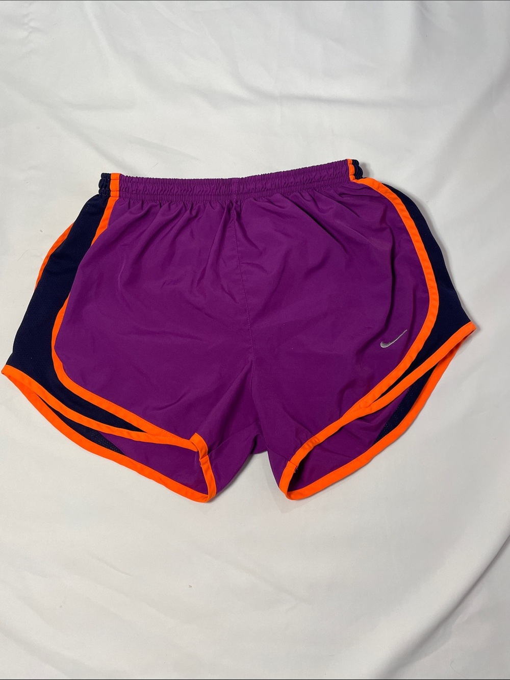 Nike Women's Purple Athletic Shorts with Orange Trim